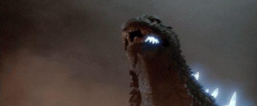A GIF of Godzilla firing his atomic breath at Mothra.