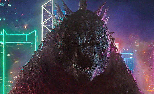 A GIF of Godzilla growling.