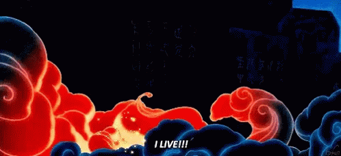 A GIF of Mushu - a small red dragon - sitting up in a cloud of smoke, captioned 'I live!'
