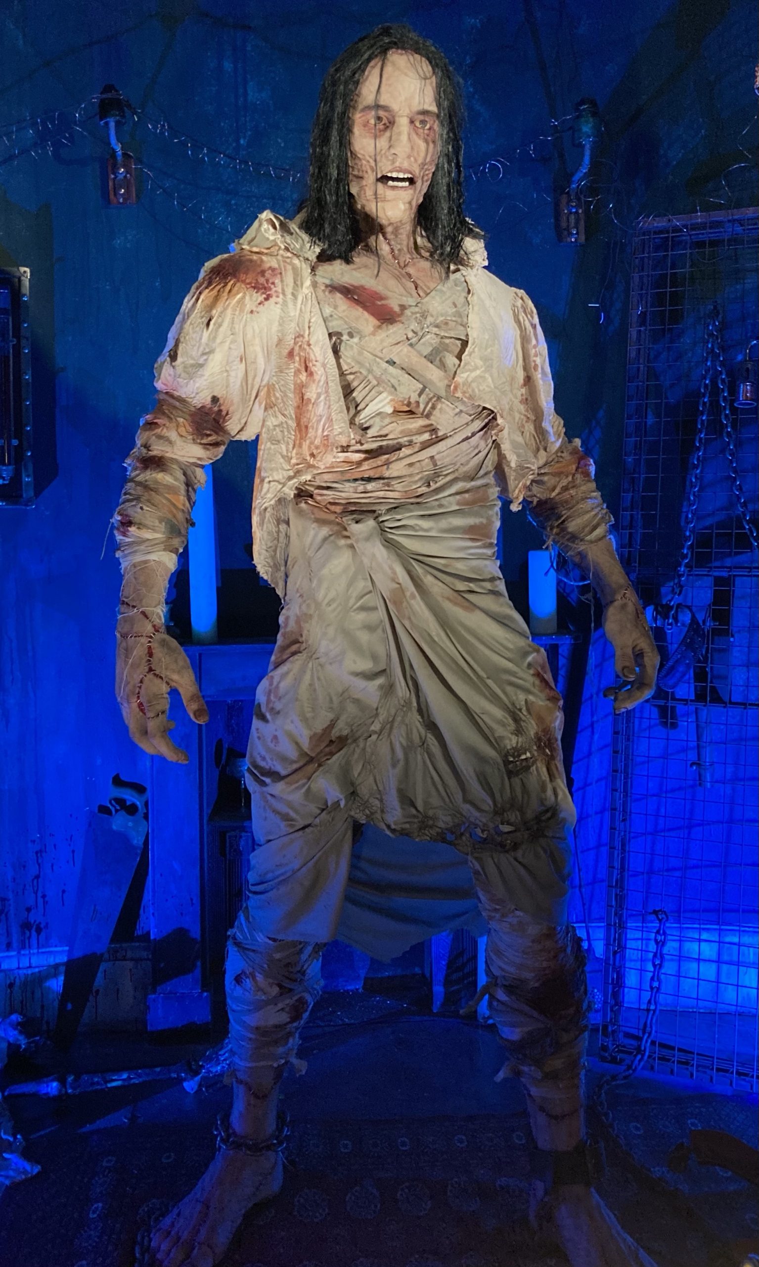 A photo of a life-size animatronic of Frankensteinās Monster.