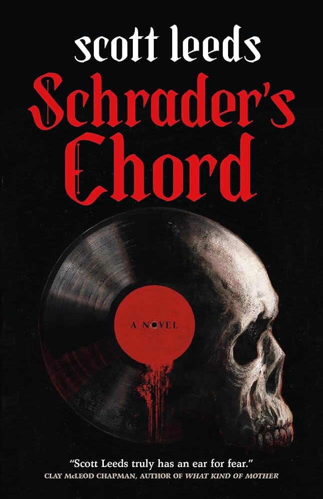 Book cover of "Schrader's Chord" by Scott Leeds, featuring a vinyl record with a red label blending into a human skull on a black background.